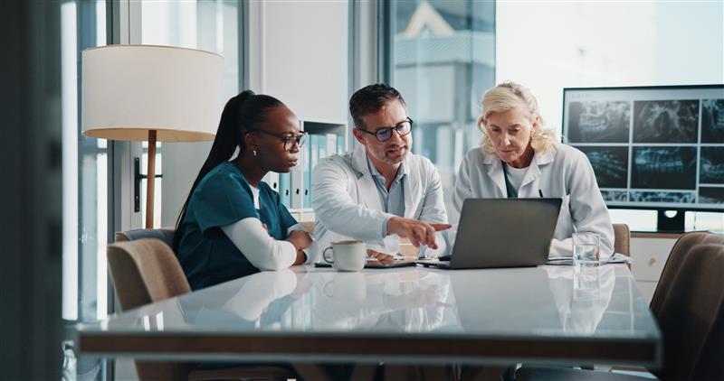 Healthcare professionals collaborating at a table