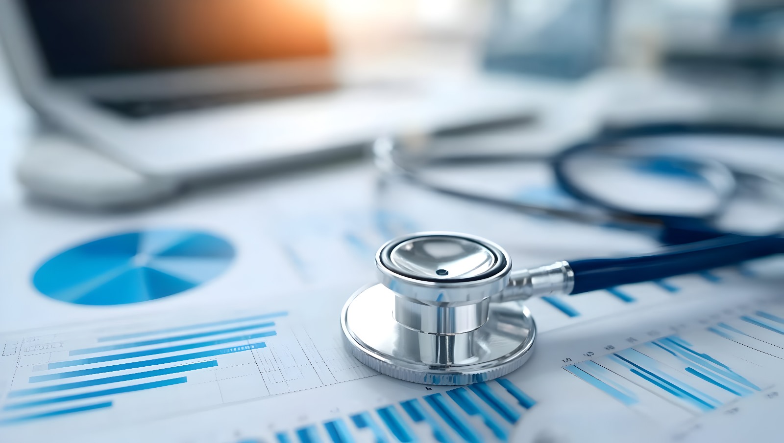 Medical stethoscope on healthcare data charts and analytics